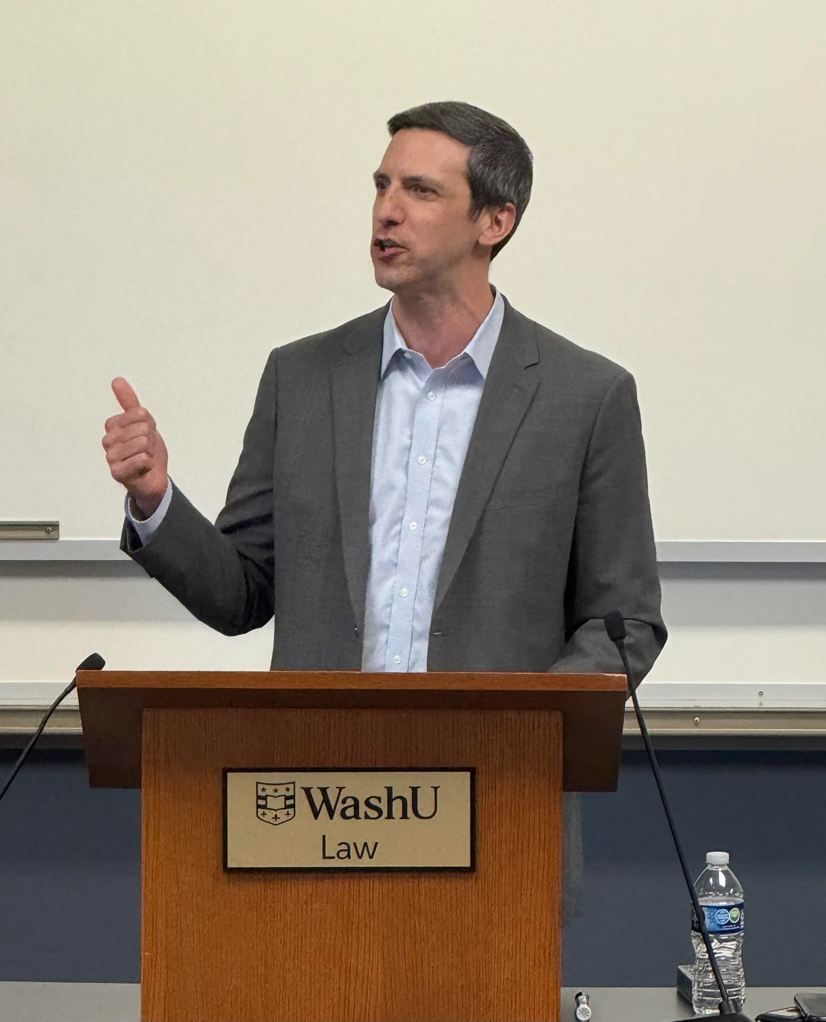 P.G. Sittenfeld speaking at WashU Law podium